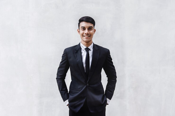 portrait-happy-businessman-black-formal-suit_34048-1053